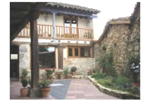 Casa de piedra con balconada, porch... — photo 3