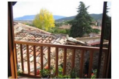 Casa de piedra con balconada, porch... — photo 8