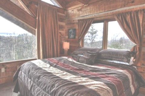 This secluded log cabin sits on top... — photo 5