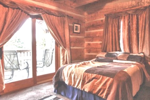 This secluded log cabin sits on top... — photo 17