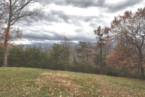 This secluded log cabin sits on top... — photo 18
