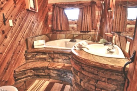 This secluded log cabin sits on top... — photo 21